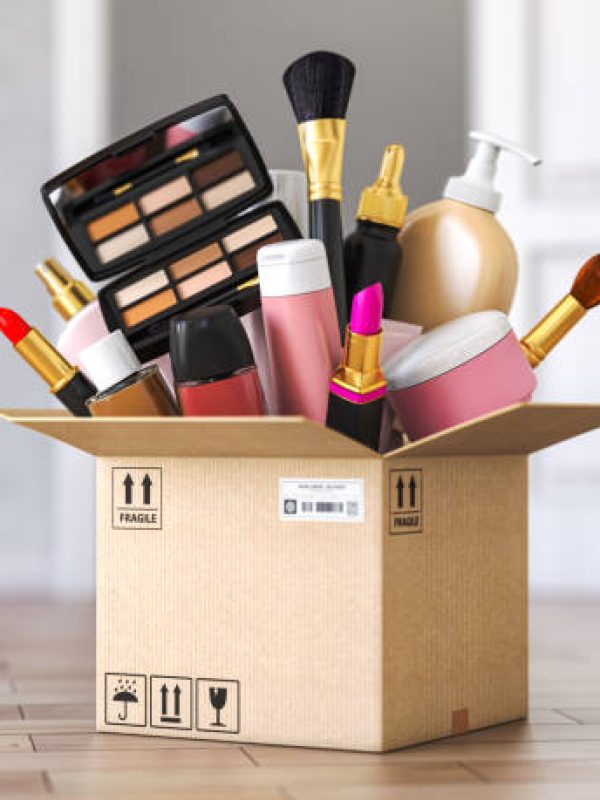 Cardboard box with cosmetics product in front od open door. Buying online and delivery cosmetics concept. 3d illustration